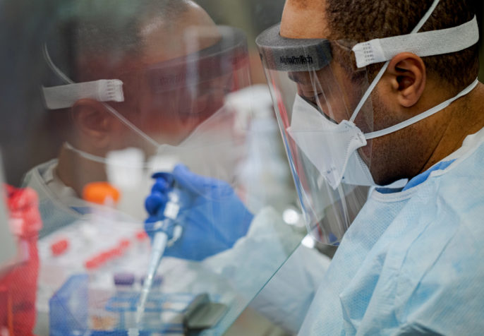 Pennsylvania Commonwealth microbiologist Kerry Pollard performs a manual extraction of the coronavirus inside the extraction lab at the Pennsylvania Department of Health Bureau of Laboratories on Friday, March 6, 2020. (Photo: Office of Tom Wolf/Flickr)