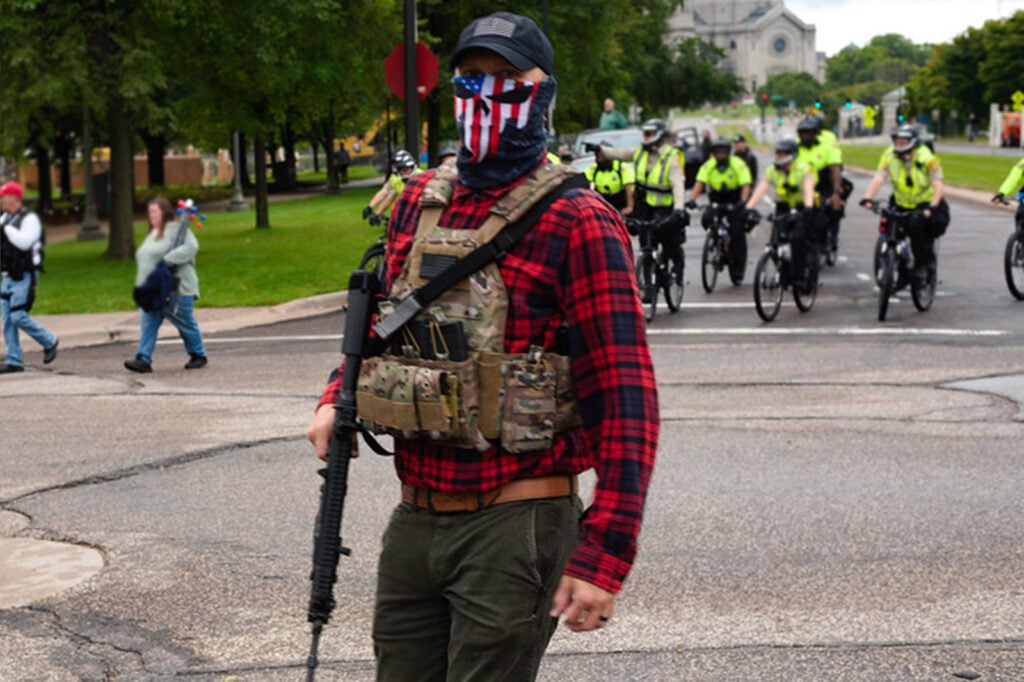 Armed protester at the United We Stand & Patriots March for America (Photo: Fibonacci Blue/CC 2.0)