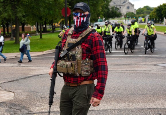 Armed protester at the United We Stand & Patriots March for America (Photo: Fibonacci Blue/CC 2.0)