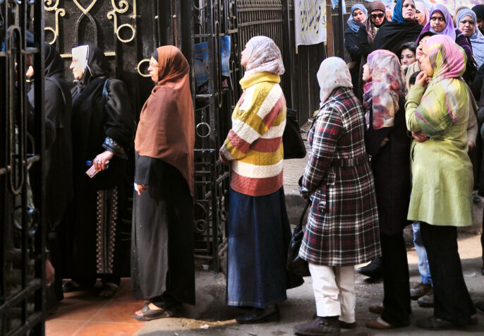 how to adopt gender policies; Egyptian women line up to vote in 2011-2012 parliamentary elections. (Photo Credit: UN Women/Fatma Elzahraa Yassin)