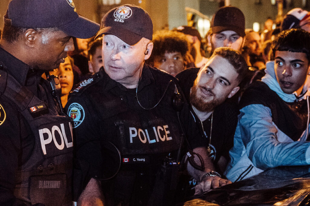 police and protesters; Defending the Right to Protest.