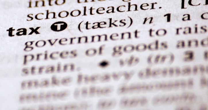 tax definition; photo credit Alan Cleaver via Flickr