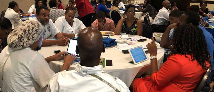 Stakeholders from civil society, government, and academia discuss the reform of social entrepreneurship laws in Jamaica using ICNL-generated resources. (Photo credit: ICNL)