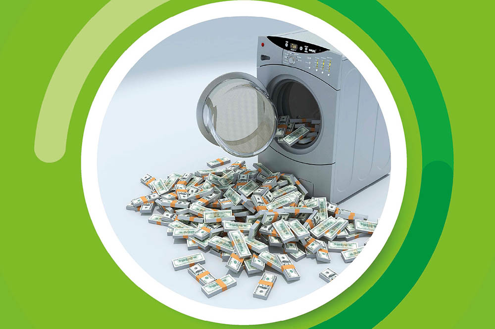 Image of a washing machine with money in front of it