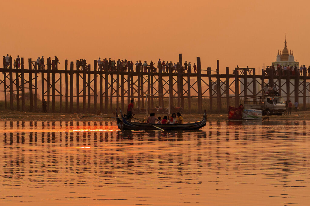 A river and bridge at sunset in Myanmar; Civic Space in Myanmar.