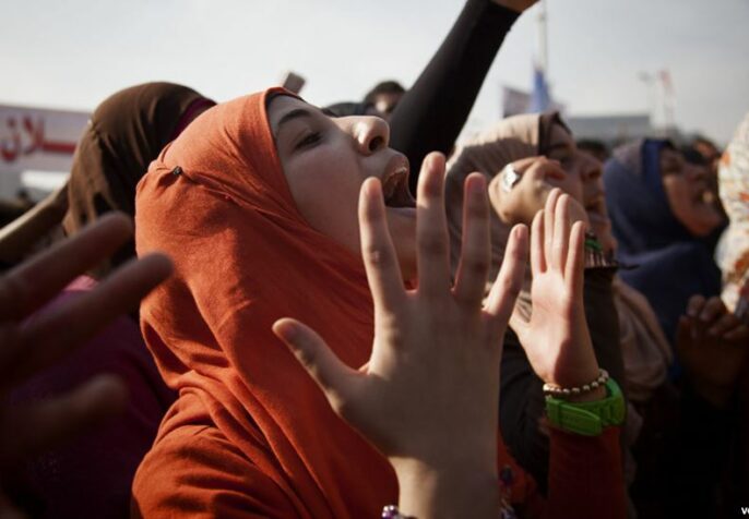 Women’s right to peaceful assembly; Protesters in Tahrir Square calling for the Muslim Brotherhood to leave government, November 30, 2012. (Y. Weeks/VOA)