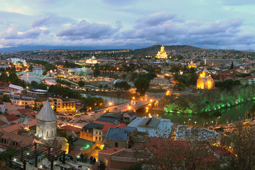 A sunset over Tbilisi, Georgia. Financial Sustainability in Georgia. (Photo: Vladimer Shioshvili/CC)