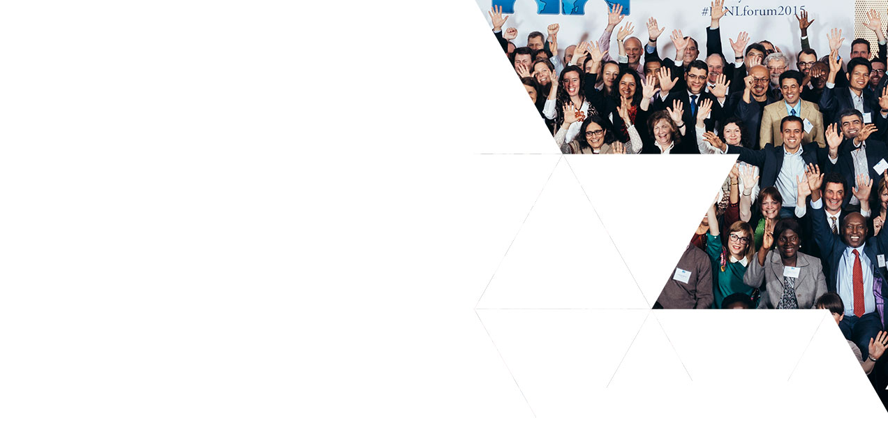 Crowd waving at the camera