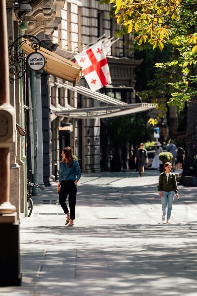 Women walking in street of Tiblisi, Georgia, photo by Josip Ivanković via Unsplash