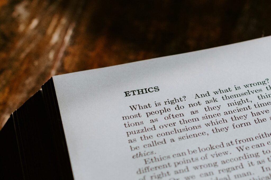 Photo of book of ethics by Kelly Sikkema via Unsplash