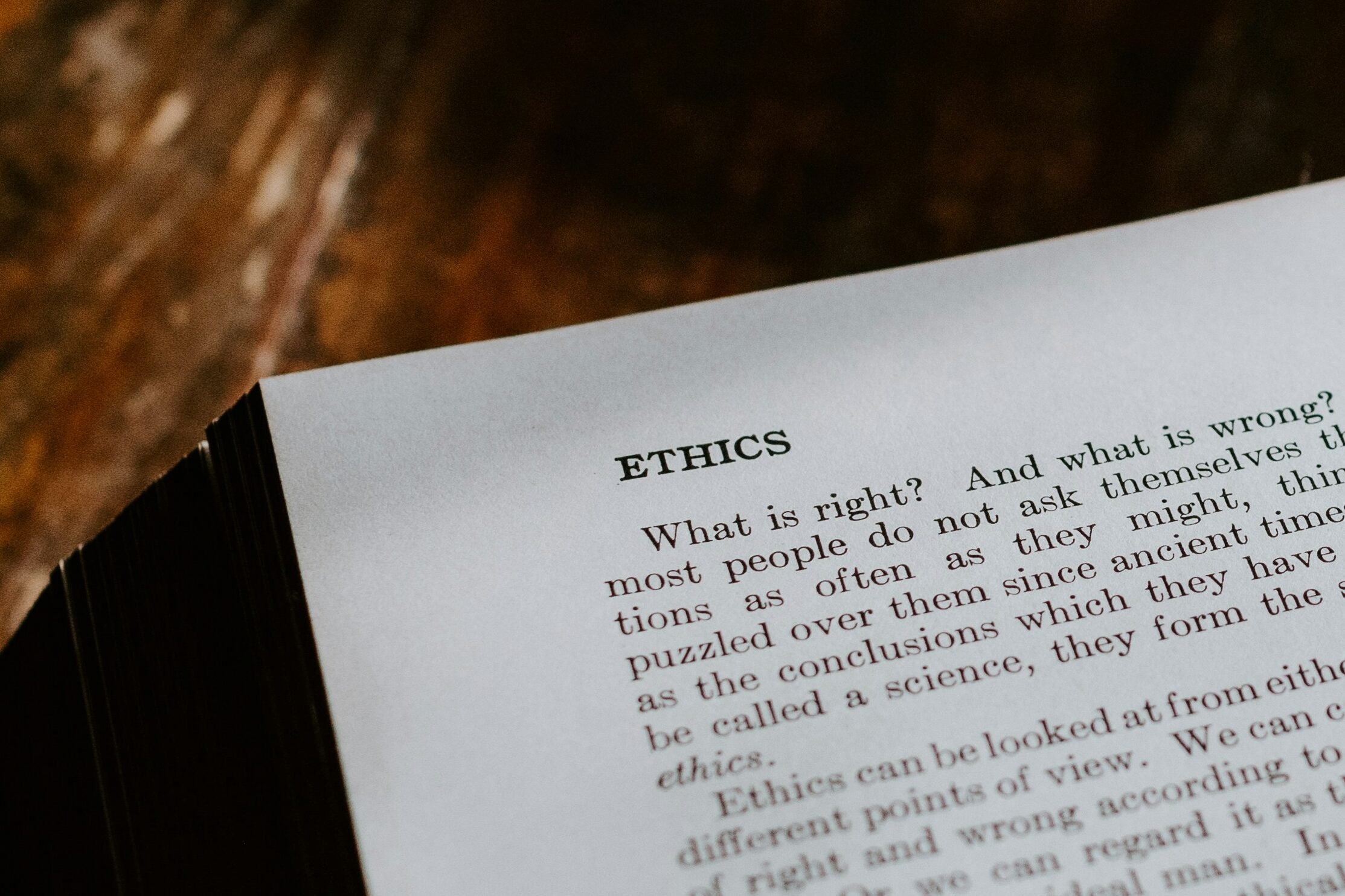 Photo of book of ethics by Kelly Sikkema via Unsplash