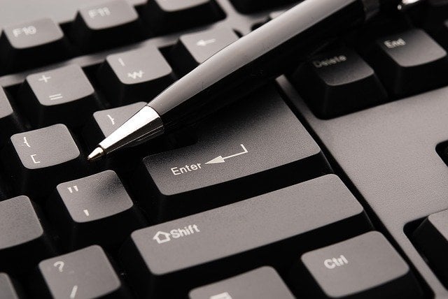 pen on keyboard (photo credit: pixabay.com)