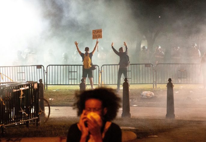 Black Lives Matter protesters enveloped in tear gas, near the White House in Washington DC, 5/31/2020 (Photo by Koshu Kunii on Unsplash)