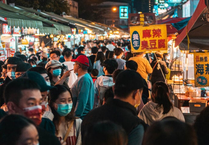 People wearing masks in Luodong Night Market, Taiwan.