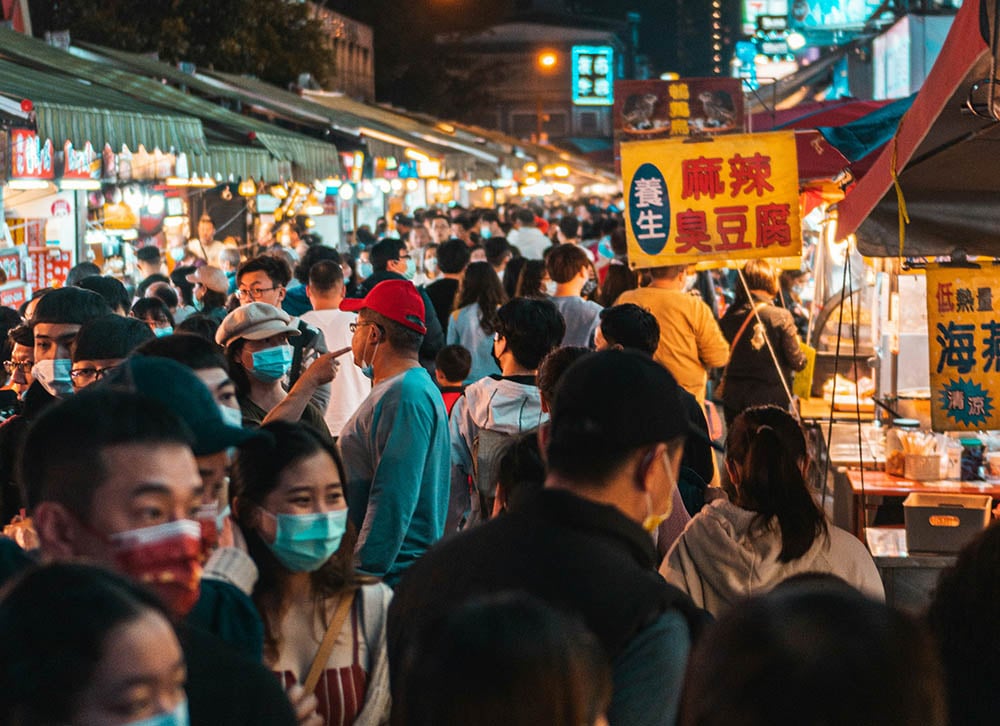 People wearing masks in Luodong Night Market, Taiwan.