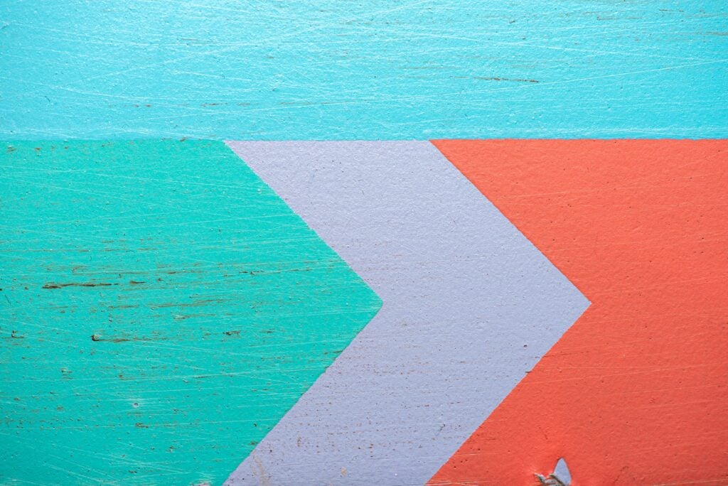Colorful arrows mural, photo by Max Kleinen via Unsplash