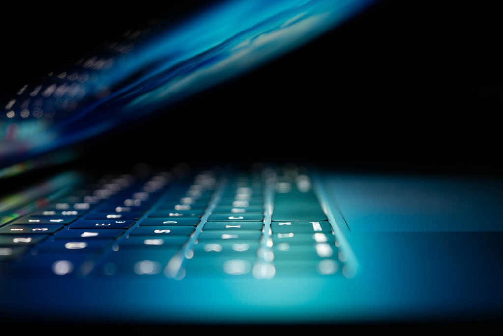 blue and white laptop computer, Global Digital Compact; photo credit Philipp Katzenberger taken from https://unsplash.com/photos/iIJrUoeRoCQ