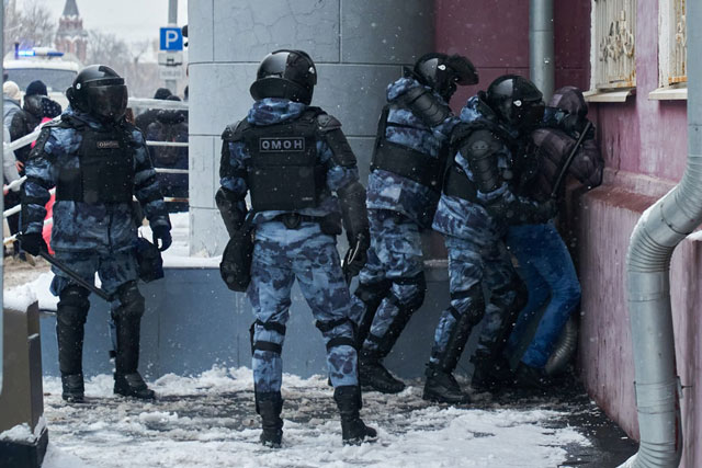 Russian police attack protestor (photo credit: unsplash.com)