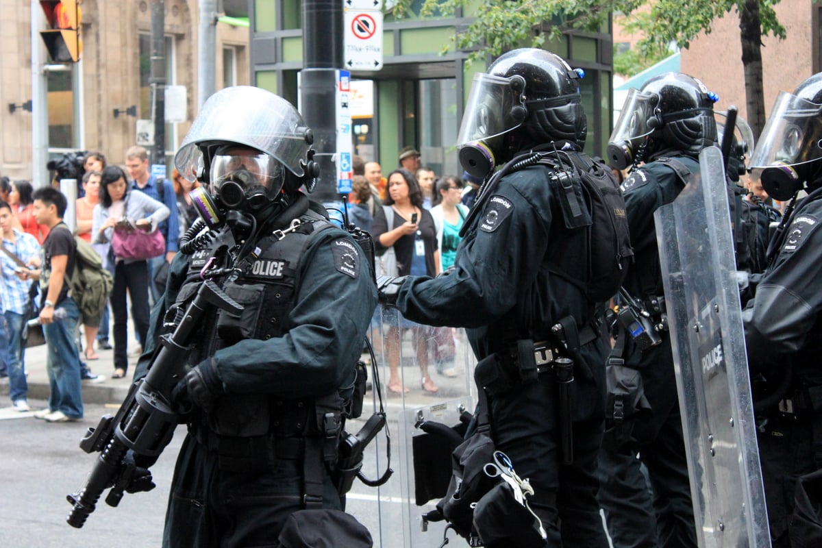 riot-police Freedom of Peaceful Assembly photo credit Chris Huggins via Flicker https://www.flickr.com/photos/43332391@N04/4736995818