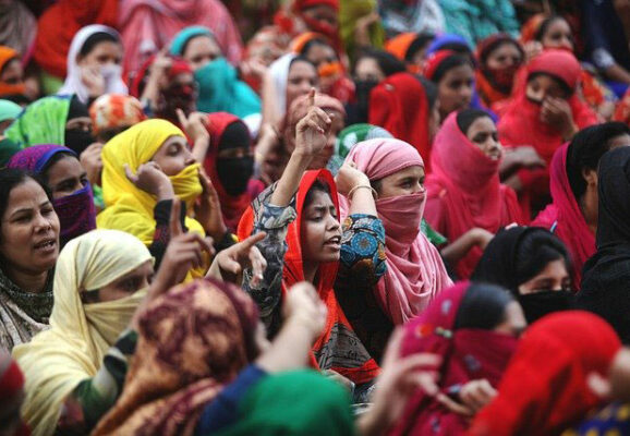 women in India protesting in crowd (photo credit: unsplash.com)