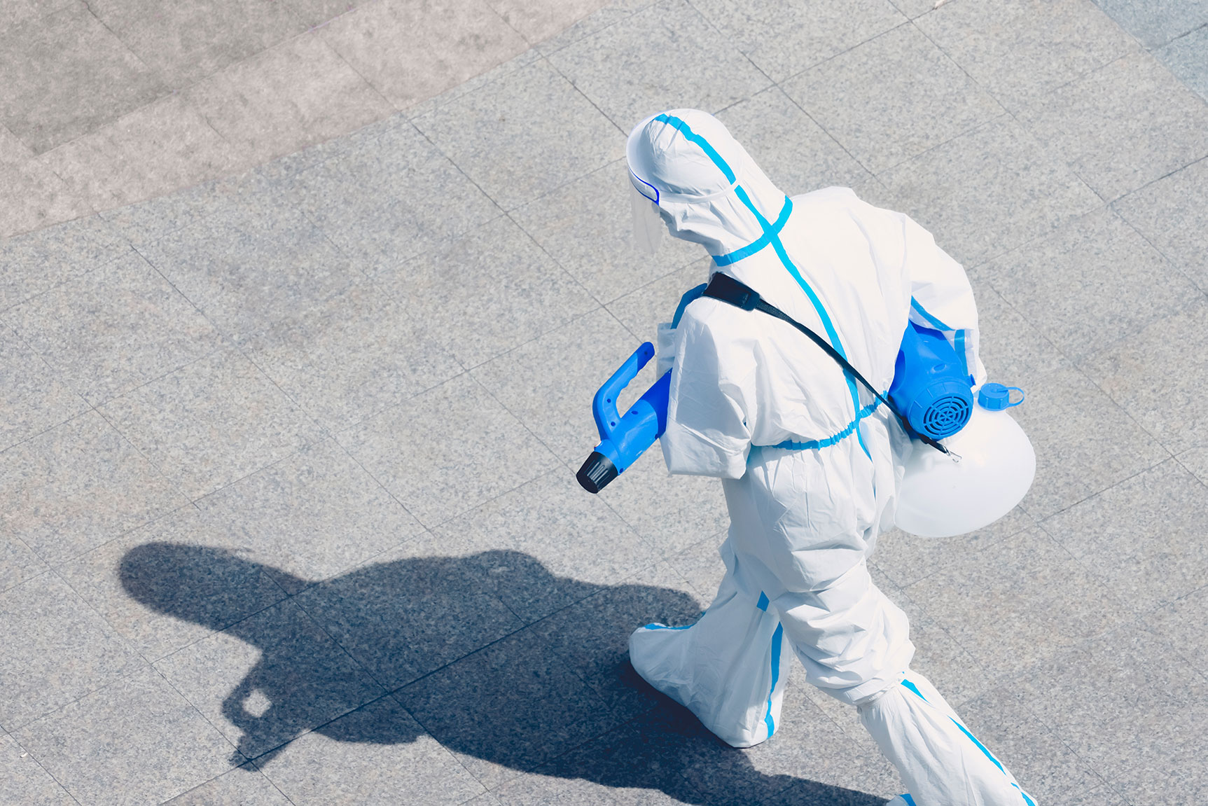 person in a white suit, photo credit Xiangkun ZHU, taken from https://unsplash.com/photos/QtEPKaES3Nk